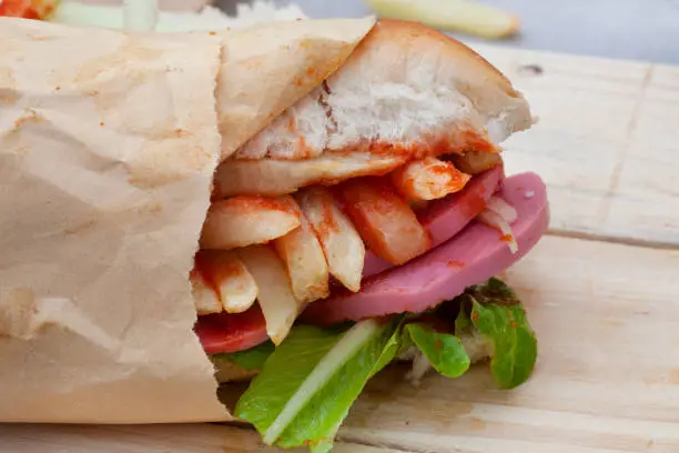 South African submarine sandwich with chips and meat known as a Gatsby Sandwich