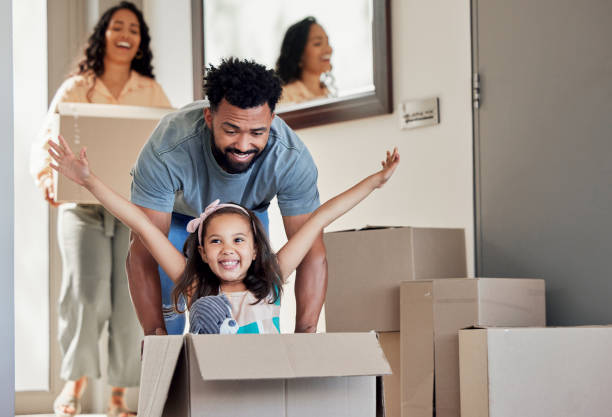 shot of a young father having fun with his daughter at home - em movimento imagens e fotografias de stock