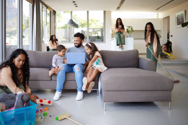 istock Shot of a young mother doing different tasks around the house 1398077022