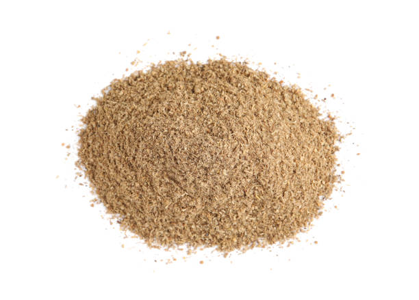 istock Heap of powdered coriander isolated on white, top view 1398077532