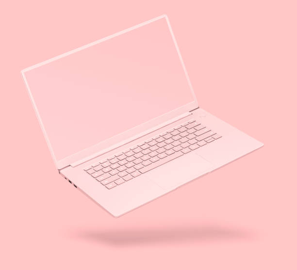 istock Laptop with blank screen on pink 1398078661