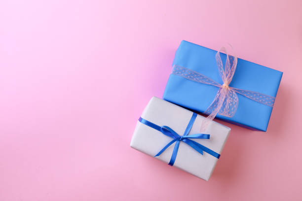 istock Gift boxes on color background. Happy womens day. Happy Mothers day.Hello Spring 1398080108