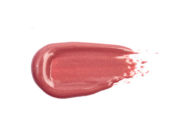 istock Lipstick swatch isolated on white background. Red lip gloss swipe 1398080886