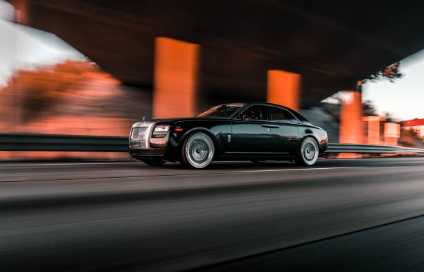 Rolls Royce Ghost Seattle, WA, USA
October 5, 2021
Black and silver two-tone Rolls Royce Ghost driving on the highway for a roller shot. rolls royce stock pictures, royalty-free photos & images