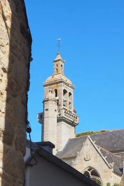 Photo of Bell tower of the Saint Raymond church In the beautiful town of Audierne in the Finistere department in Brittany