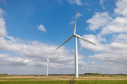 Wind turbine in the flat landscape close to the town Ribe in south west part of the Danish peninsular Jutland