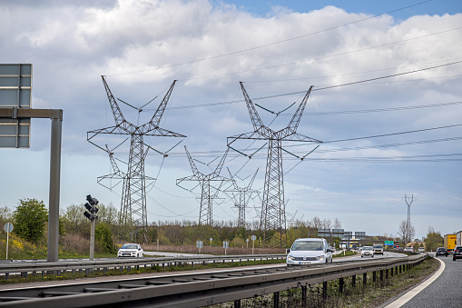 High voltage lines running parallel with a high way on the Danish island Funen