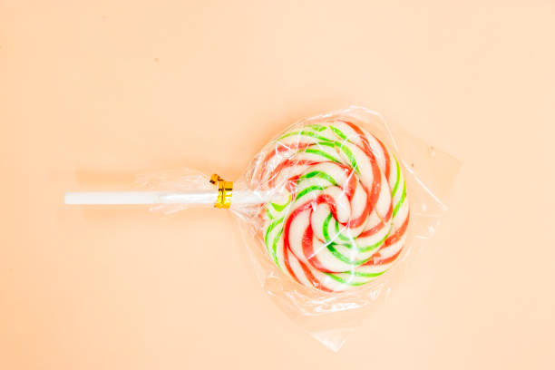 istock lollipop isolated on colorful background,packaging design, food concept 1398095589