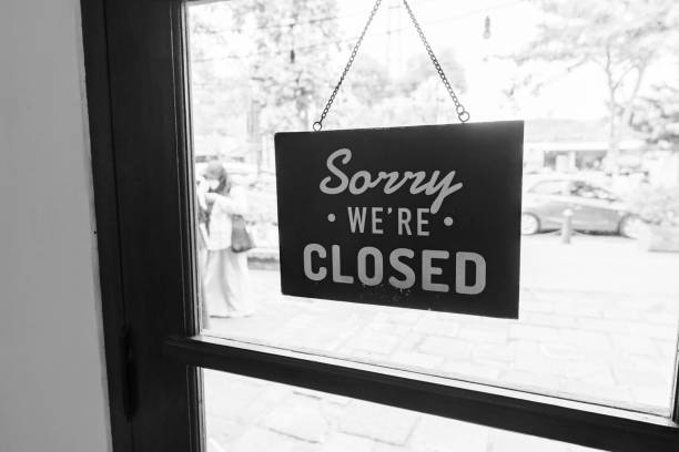 Closed Signage on Window Shop stock photo