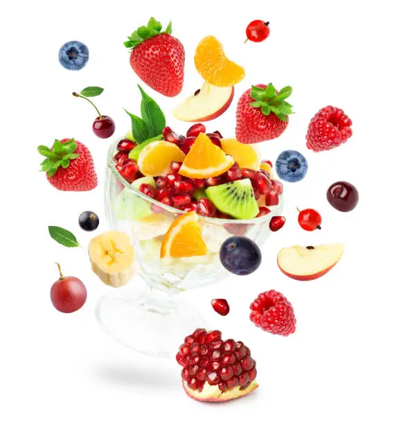 Fruits. Mixed fruits on white background. Fruit salad. Falling fruits.