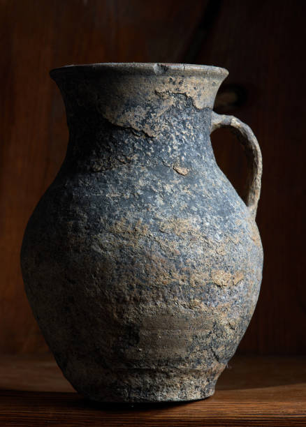 istock Antique earthenware jug on wooden background 1398099040
