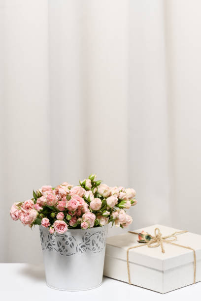 istock Beautiful bouquet with gift 1398099796