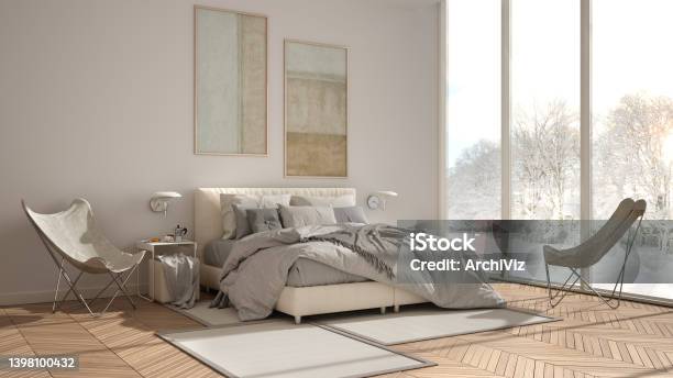 Modern White Minimalist Bedroom Double Bed With Pillows And Blankets Parquet Bedside Tables And Carpet Panoramic Window With Winter Panorama With Trees And Snow Interior Design Stock Photo - Download Image Now