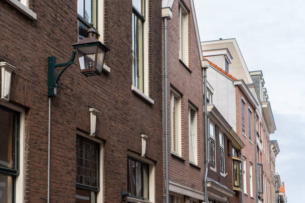 istock Haarlem, the Netherlands - March, 2022: Cozy Street view and generic architecture in Haarlem with typical Dutch style buildings. 1398103537