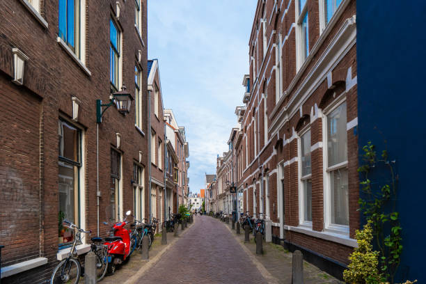 istock Haarlem, the Netherlands - March, 2022: Cozy Street view and generic architecture in Haarlem with typical Dutch style buildings. 1398103559