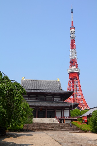 Tokyo Tower structure and Zojoji Temple in Japan. It is a communications and observation tower in Shiba-koen neighborhood of Minato, Tokyo.