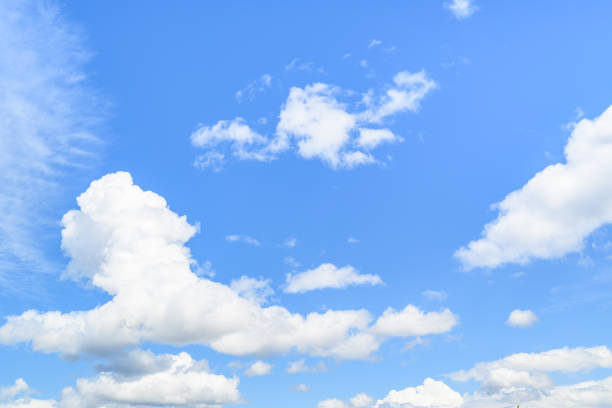 istock Beauty and cloud shapes in blue sky 1398105184