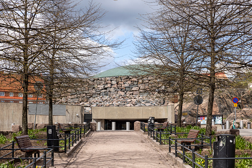 Helsinki, Finland - May 15th 2022: Temppeliaukio church downtown Helsinki is a famous landmark because it's an underground church built mainly into bedrock.