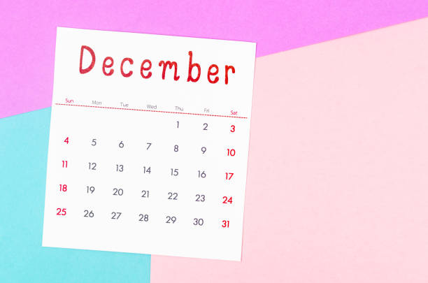 istock December 2022 calendar on multicolored background. 1398107717