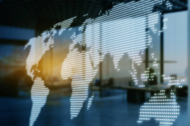 istock Glowing digital map hologram on blurry office interior backdrop. Worldwide technology and network concept. Double exposure. 1398107775
