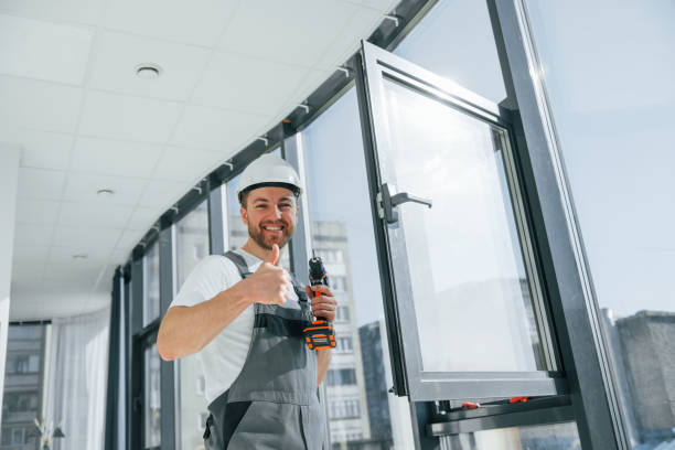 istock Using the drill. Repairman is working indoors in the modern room 1398107814