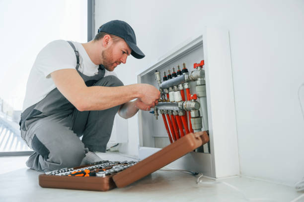 istock With special tools. Repairman is working indoors in the modern room 1398108057