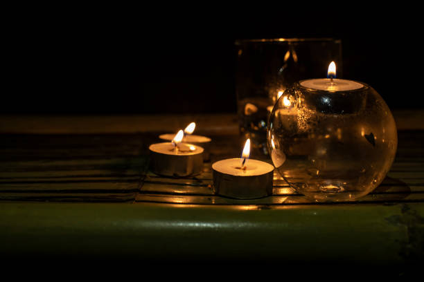 istock light from a group of candles 1398108723