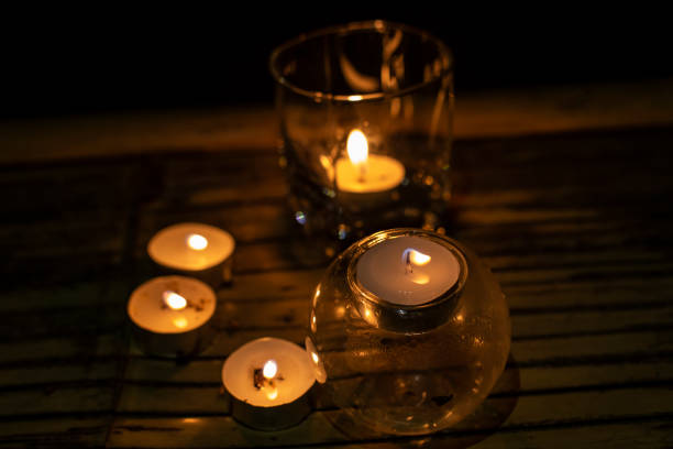 istock light from a group of candles 1398108724