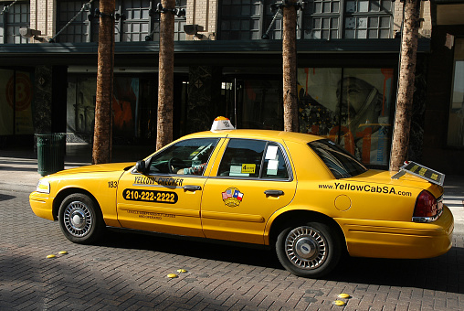 Texas, USA - September 19, 2006:Yellow taxi circulating through the streets of the city of San Antonio