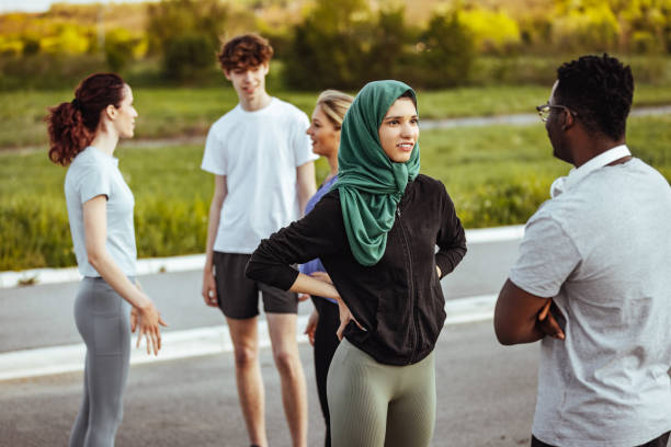 istock Group Of Friends Socializing outside Together 1398112695