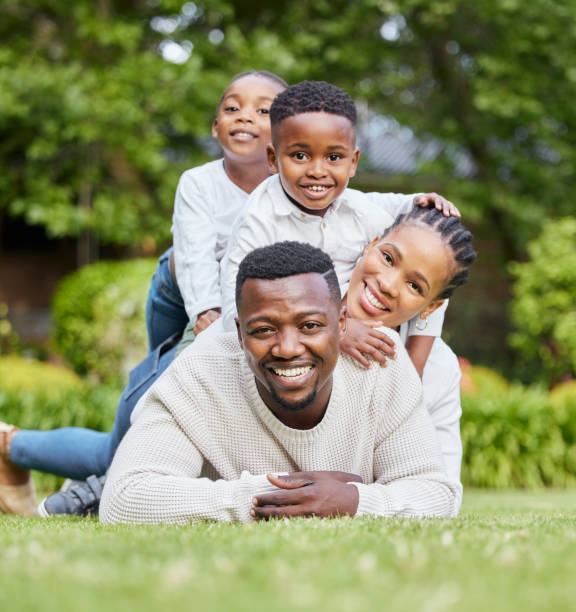 Shot of a family bonding outside Family never leave each other's side african descent family stock pictures, royalty-free photos & images