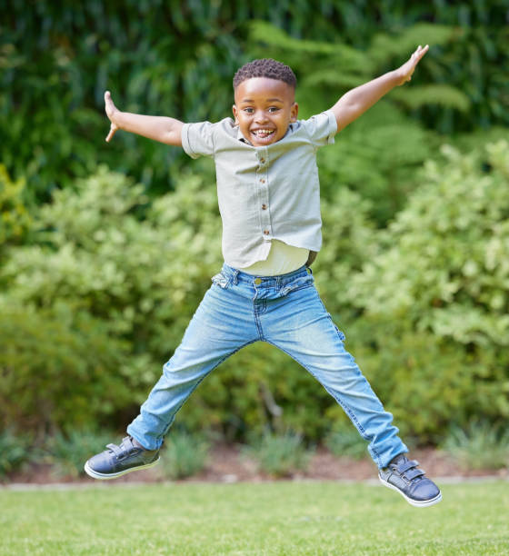 istock Shot of a little boy playing outside 1398112747