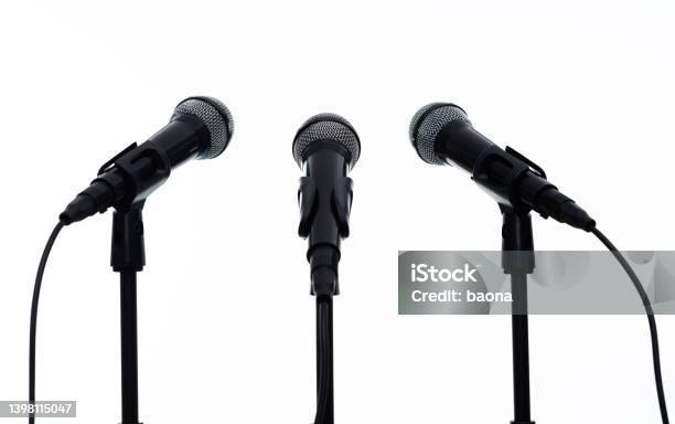 Three Microphones On White Background Stock Photo - Download Image Now - Microphone, Standing, Cut Out