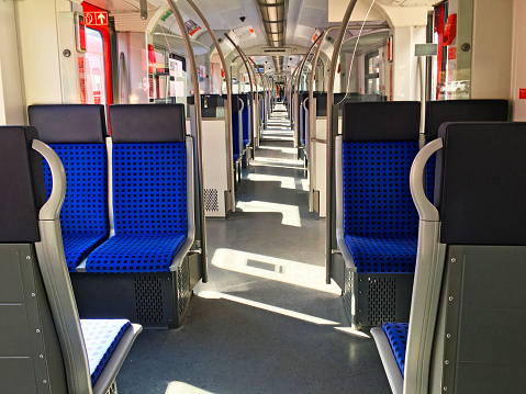 MADRID, SPAIN - APRIL 13, 2019: Inside empty Metro wagons on Line 9, an unusual sight for this type of transport. The Metro of Madrid is usually much busier during rush hour.