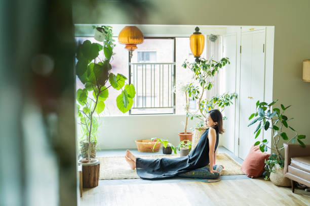 istock A woman relaxing surrounded by foliage plants 1398115955