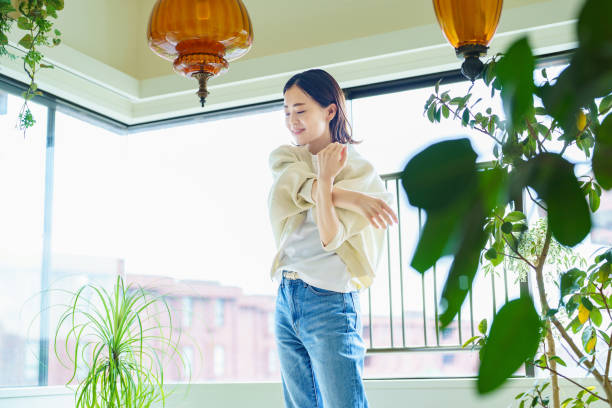 istock Woman stretching in the room 1398121021