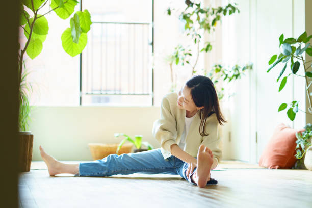istock Woman stretching in the room 1398121086