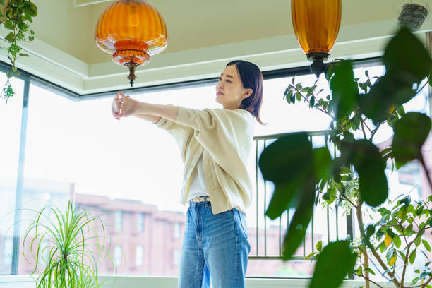istock Woman stretching in the room 1398121906