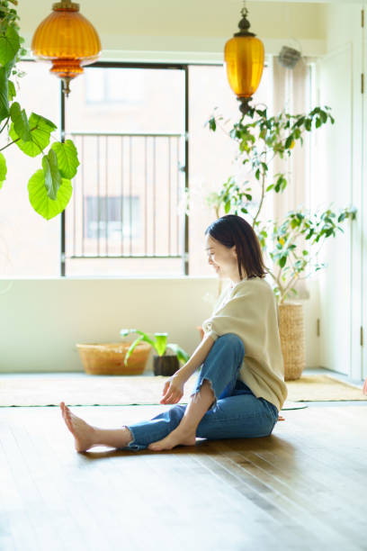 istock Woman stretching in the room 1398121947