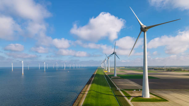 windmill farm green energy stock photo