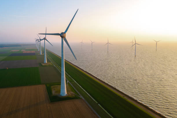 windmill farm green energy stock photo