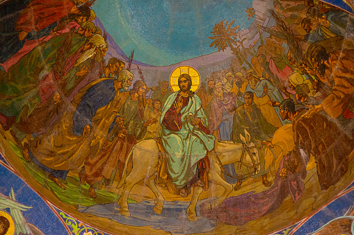 St. Petersburg, Russia - January 5, 2020: Fresco of Jesus Christ riding a donkey into Jerusalem under the dome of the Church of the Savior on Spilled Blood in Saint Petersburg, Russia