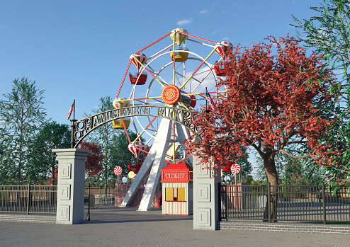 Bucharest, Romania, 30 November 2023: Big wheel at the West Side Christmas Market in Drumul Taberei neignbourhood, in a sunny cold day with blue sky