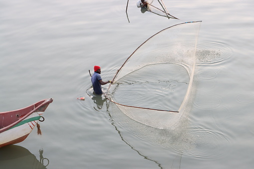 Fisherman Fishing at Ennore Creek, North Chennai, Tamil Nadu in India on February 02, 2020