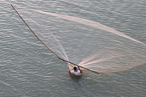 Fisherman Fishing at Ennore Creek, North Chennai, Tamil Nadu in India on February 02, 2020