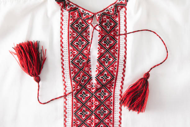 national ukrainian embroidery. handmade. cross stitch in red, black and white. traditional shirt of ukraine. embroider background - embroider imagens e fotografias de stock