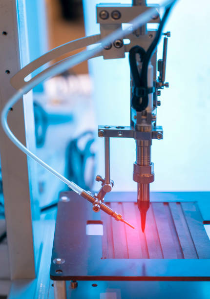 istock automatic robot for print circuit board (PCB)assembly machine during soldering or welding part 1398128218