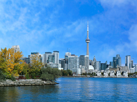 City skyline view of CN Tower in Toronto, Ontario, Canada from the marina along Lake Ontario