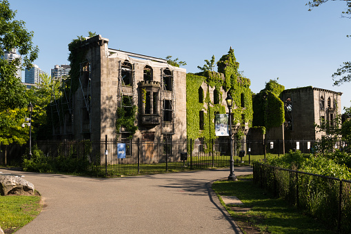 New York City, USA - June 3, 2019: The still standing Smallpox Hospital on Roosevelt Island late in the day.