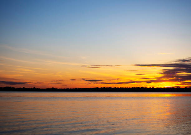 istock Colorful backdrop. Sea landscape. Blue sky. Sunset on the river. 1398134745